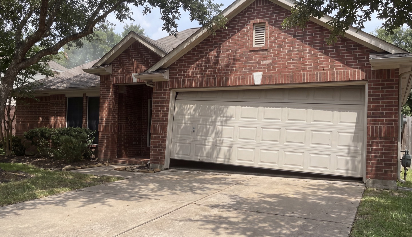 Broken garage door torsion spring