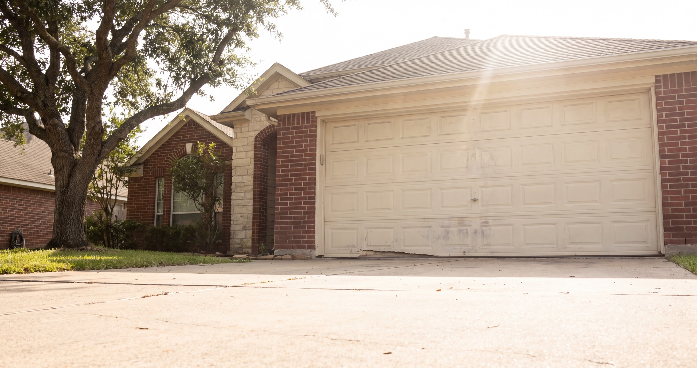 Sunlit garage door on a Texas home